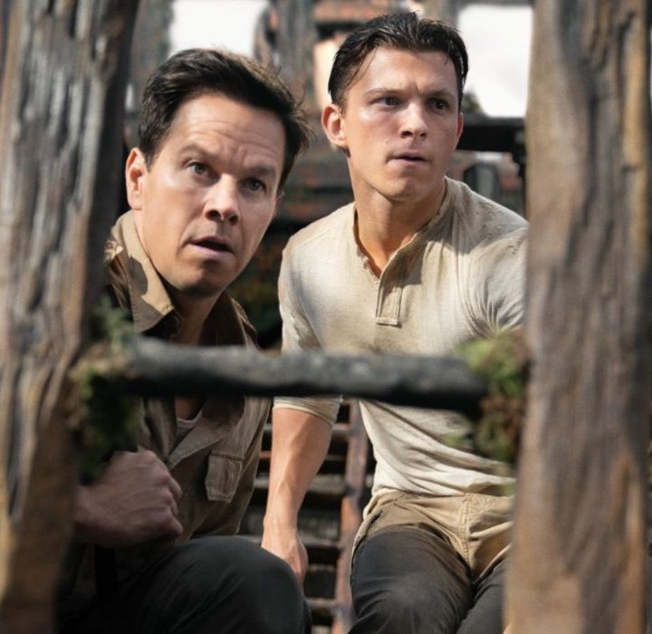 Nathan Drake and Sully hide from the bad guys in Uncharted.