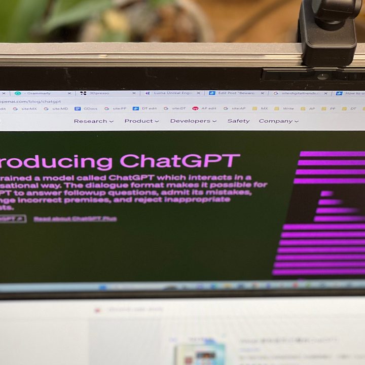 OpenAI's ChatGPT blog post is open on a computer monitor, taken from a high angle.
