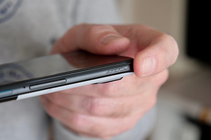 A person pressing the Asus ROG Phone 7 Ultimate's AirTriggers.