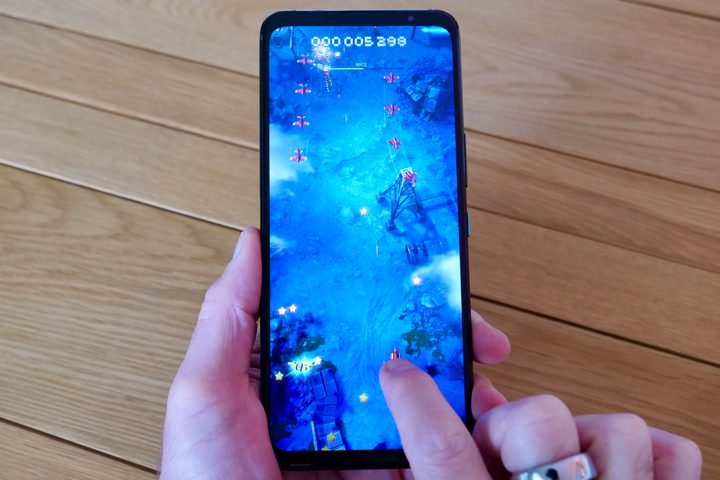 Playing a game on the Asus ROG Phone 7 Ultimate.