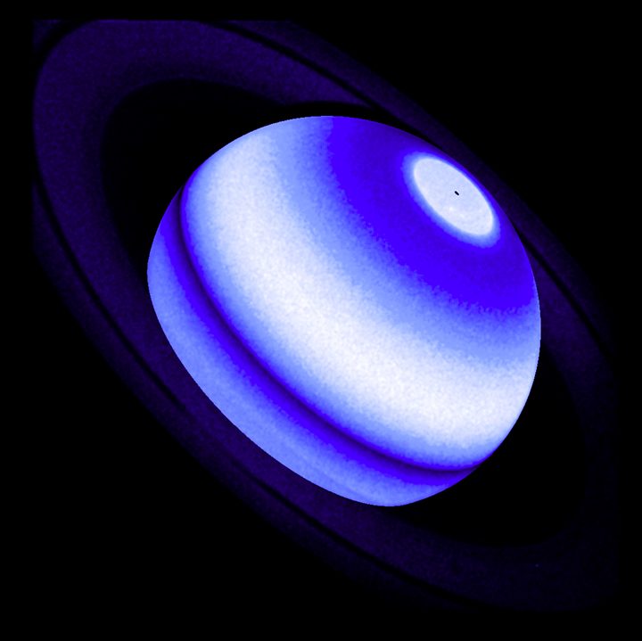 This is a composite image showing the Saturn Lyman-alpha bulge, an emission from hydrogen which is a persistent and unexpected excess detected by three distinct NASA missions, namely Voyager 1, Cassini, and the Hubble Space Telescope between 1980 and 2017.