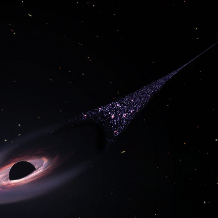 This is an artist's impression of a runaway supermassive black hole that was ejected from its host galaxy as a result of a tussle between it and two other black holes.