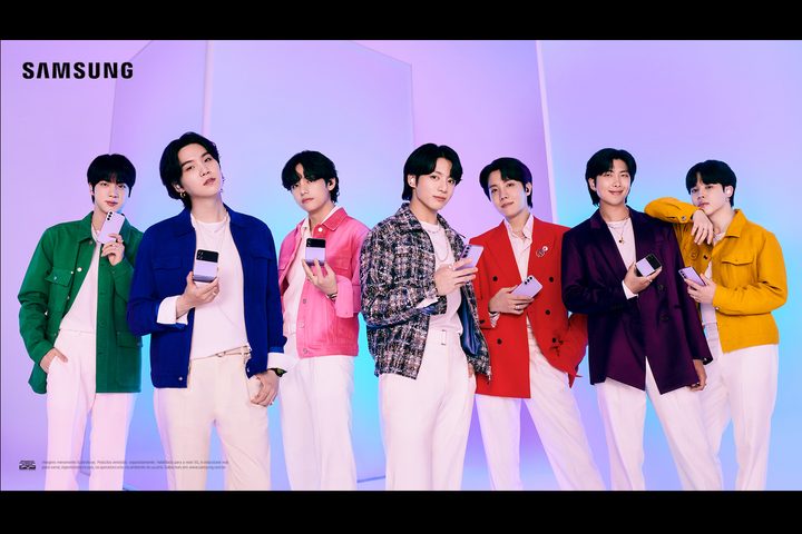 A promotional image featuring BTS holding Samsung phones.