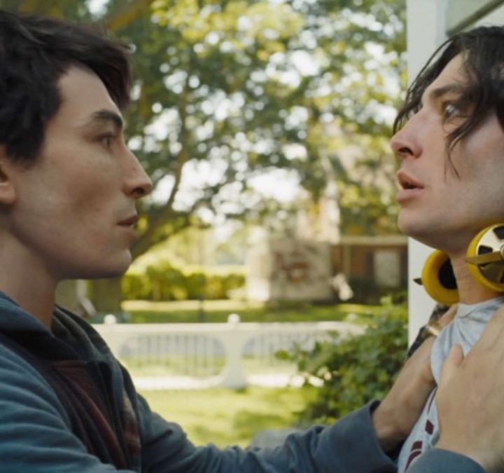 Ezra Miller pushed a version of himself up against a wall in The Flash.