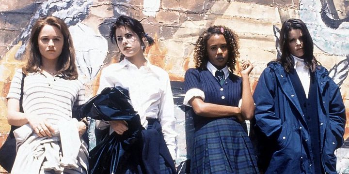 The four witches in The Craft stand in their school uniforms