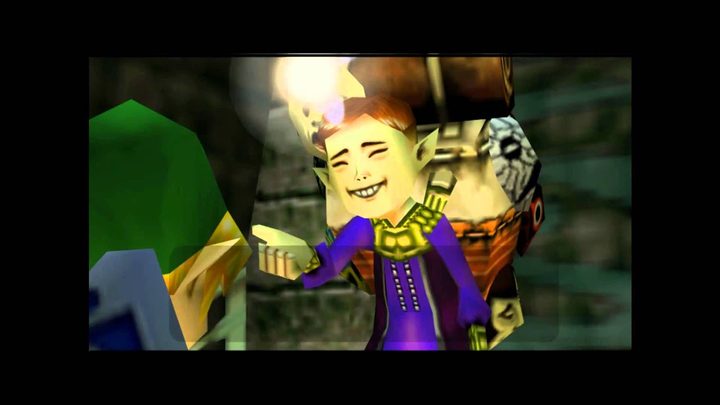 The happy mask salesman holding his hand out to Link.