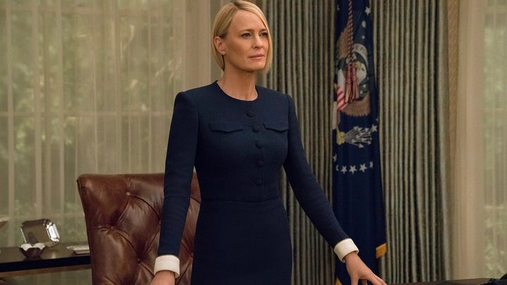 Robin Wright sitting behind a presidential desk in a scene from House of Cards on Netflix.
