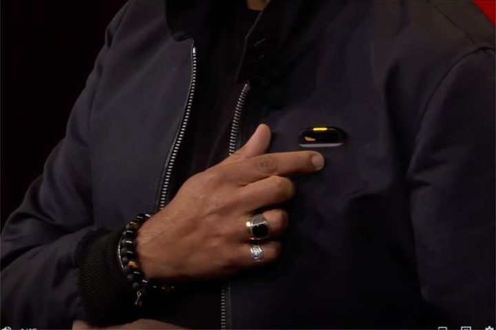 Humane's wearable inside someone's shirt pocket.