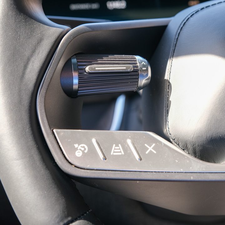A closeup of the Steering Wheel buttons in a Lucid Air.