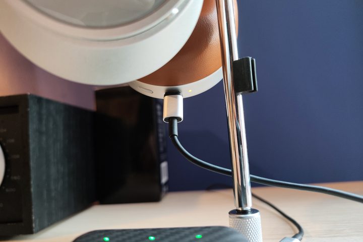 Master & Dynamic MC300 showing headphones charging.