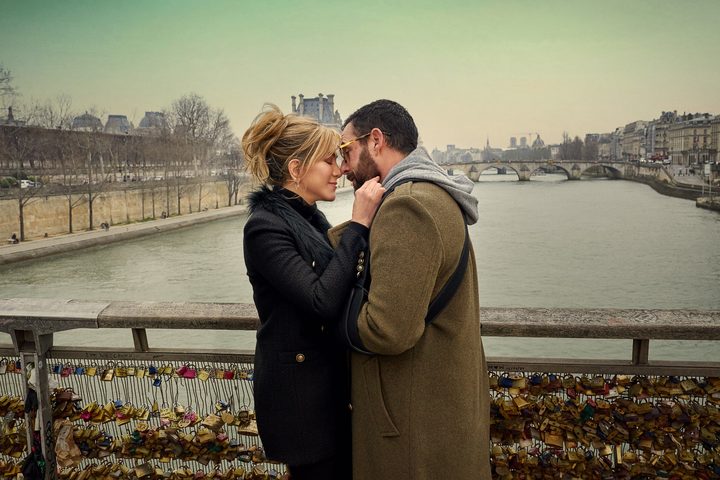 A man and a woman embrace in Murder Mystery 2.