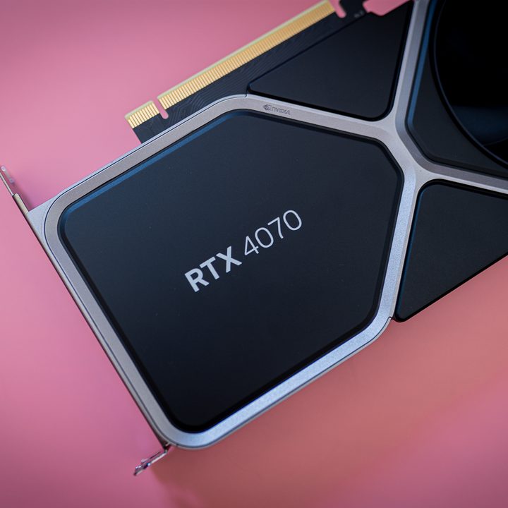 The RTX 4070 graphics card on a pink background.