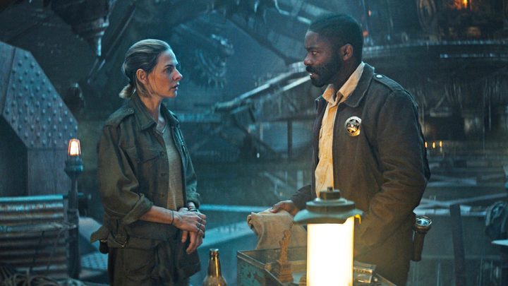 A man and a woman talk in Silo.