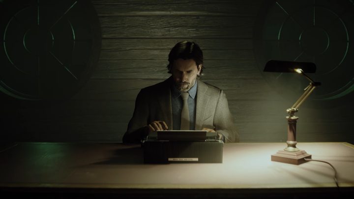 Alan Wake sitting at a desk with a typewriter.
