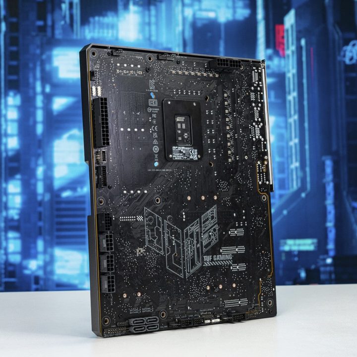 An Asus TUF Gaming Z790 BTF motherboard with hidden connectors, shown from the rear.