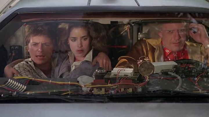 Marty, Jennifer, and Doc Brown in the Delorean in "Back to the Future."