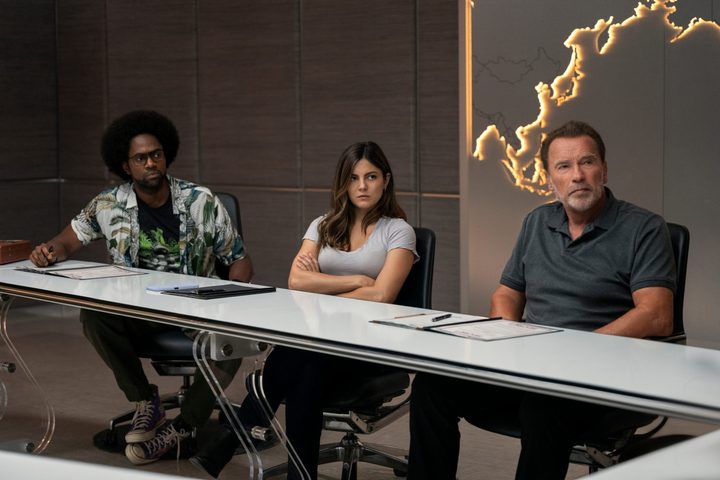 Barry, Emma, and Luke sit at a table together in FUBAR.