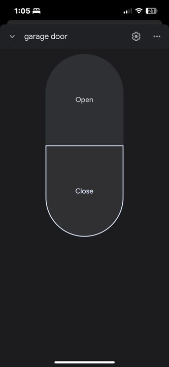 The new Google Home garage controls, featuring a pill-shaped design with open and close buttons.