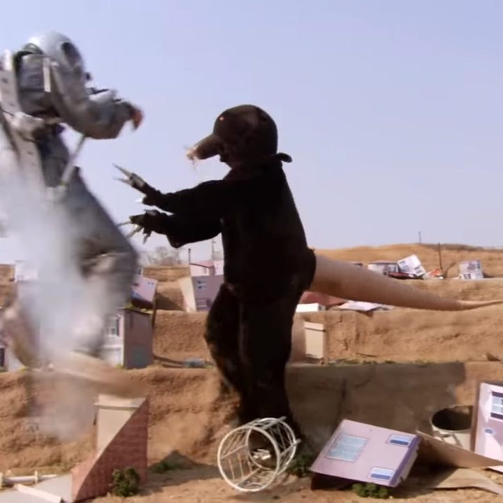 George Michael flying into Tobias, dressed as a mole, with a jetpack in "Arrested Development."