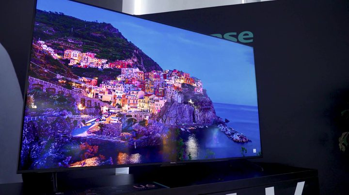 A village built into a seaside mountainside shown on a Hisense U6K.