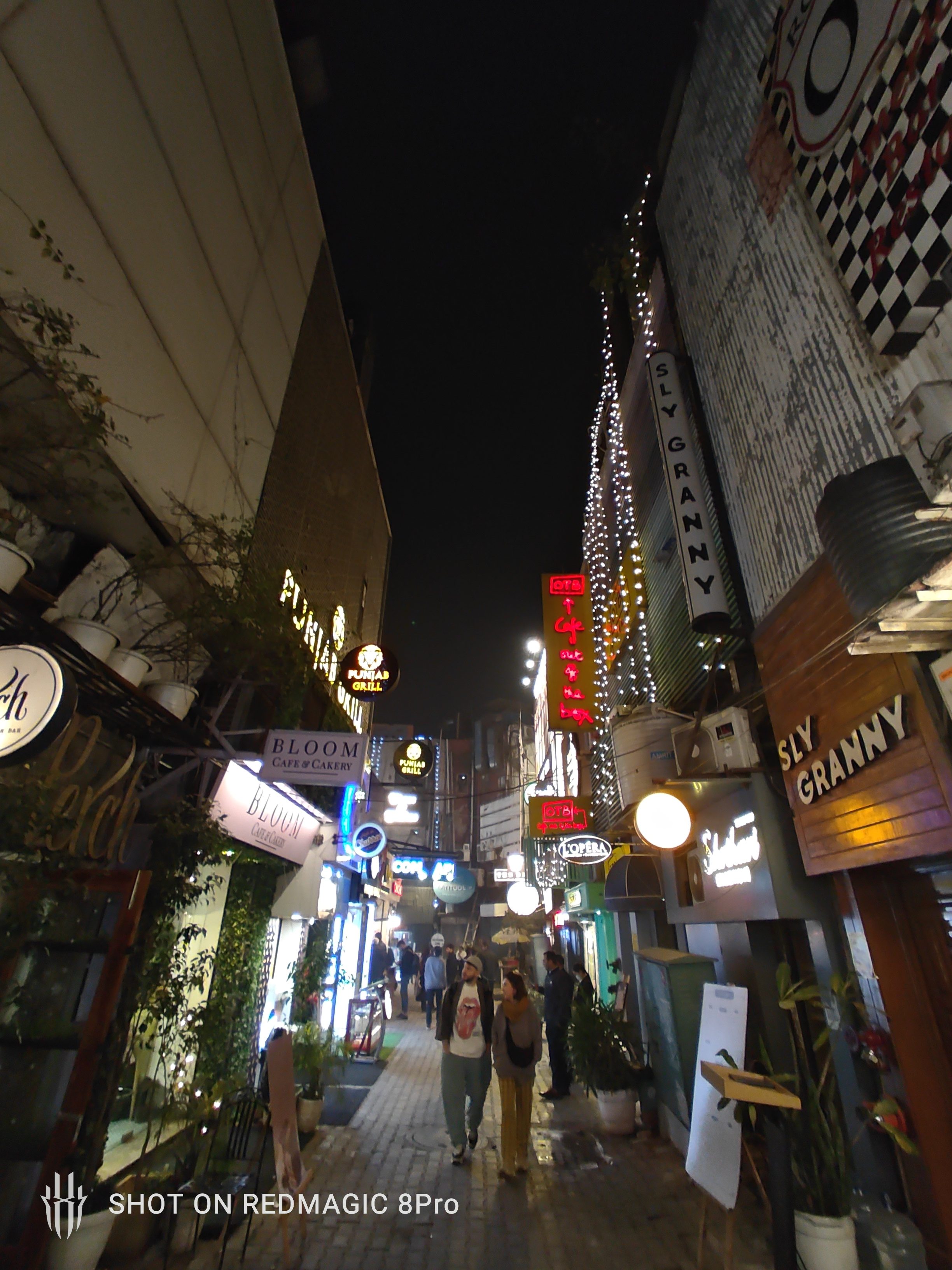 Shops in Khan market, Delhi at night.