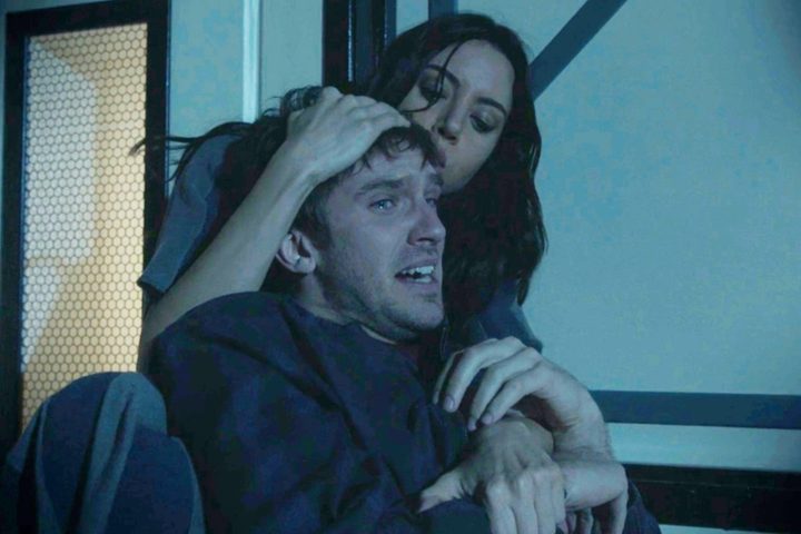 Lenny holds a crying David in Legion season 2.