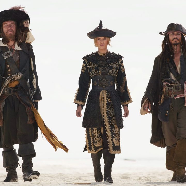 Three pirates walk together in unison in At World's End.