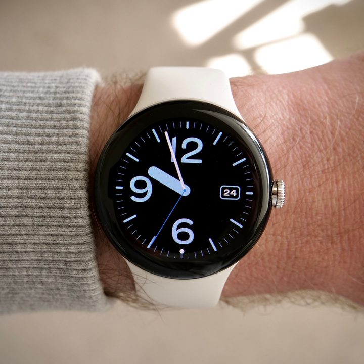 The Pixel Watch on a person's wrist.