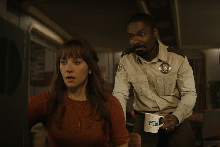 Rashida Jones and David Oyelowo look at a computer monitor together in Silo.