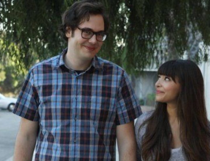 Robby walks with Cece on the sidewalk in New Girl