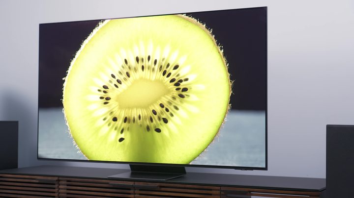 Closeup of a kiwi cross-section on a Samsung S95C OLED TV.