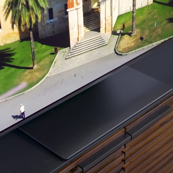 The pedestal base of a Samsung S95C OLED TV.