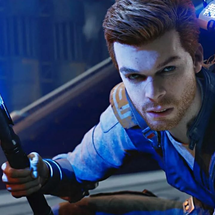 Cal Kestis wielding his blue lightsaber and carrying BD-1 in Star Wars Jedi: Survivor.