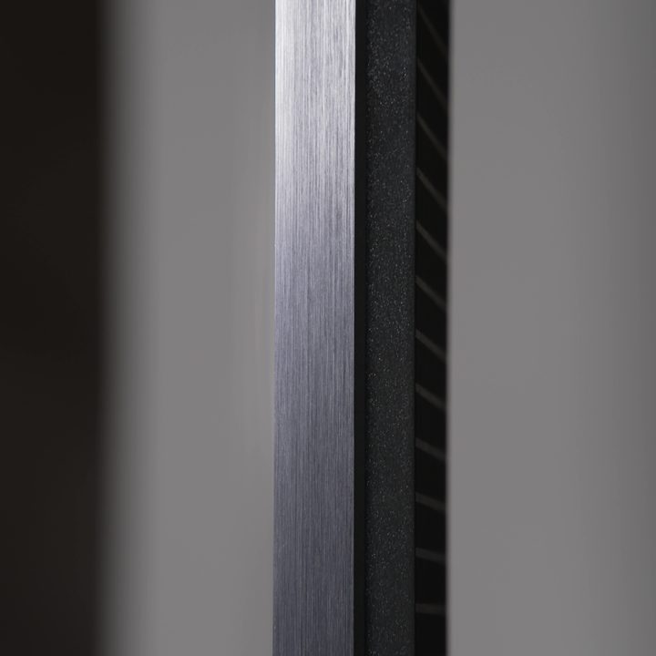 A profile view of the thinness of the TCL QM8 Mini-LED TV.