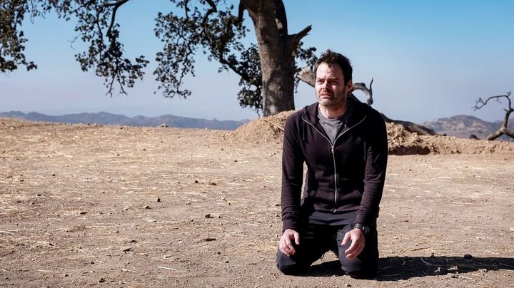 Barry sits down on the dirt in Barry.