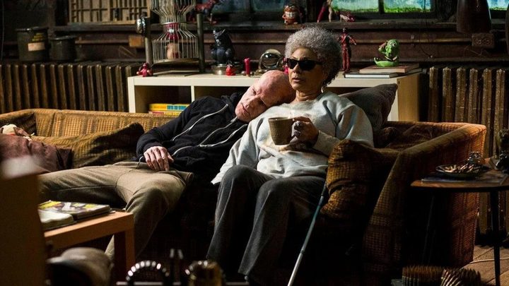 Deadpool leans on Blind Al in Deadpool.