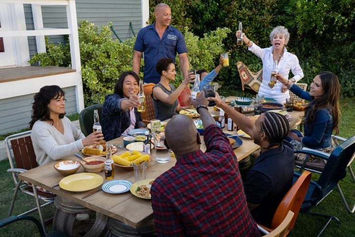 A family has a dinner outside in Fast X.