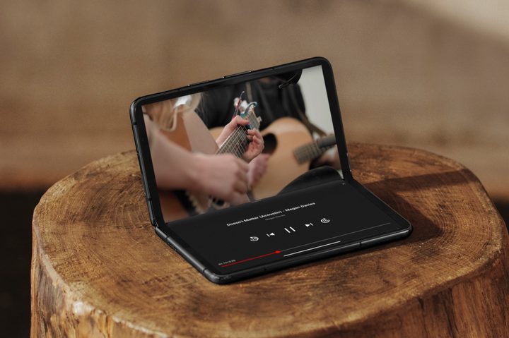 Google Pixel Fold, in Tabletop Mode, with the YouTube app open.
