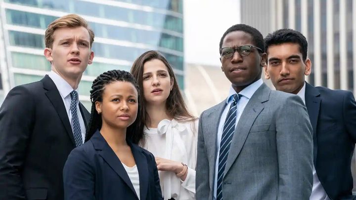 5 young graduates from HBO Max series Industry standing outside together.