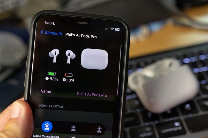 An iPhone showing one nearly dead AirPod Pro.