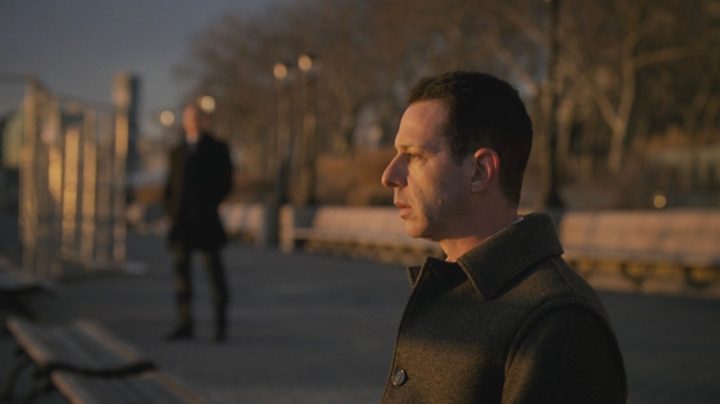 Kendall sits by a river in the Succession finale.