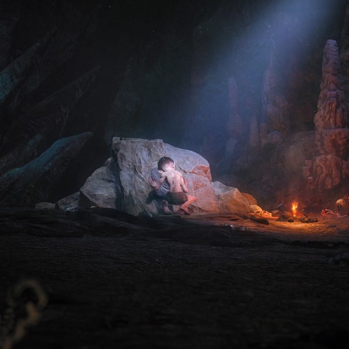 Gollum hides behind a rock in The Lord of the Rings: Gollum.
