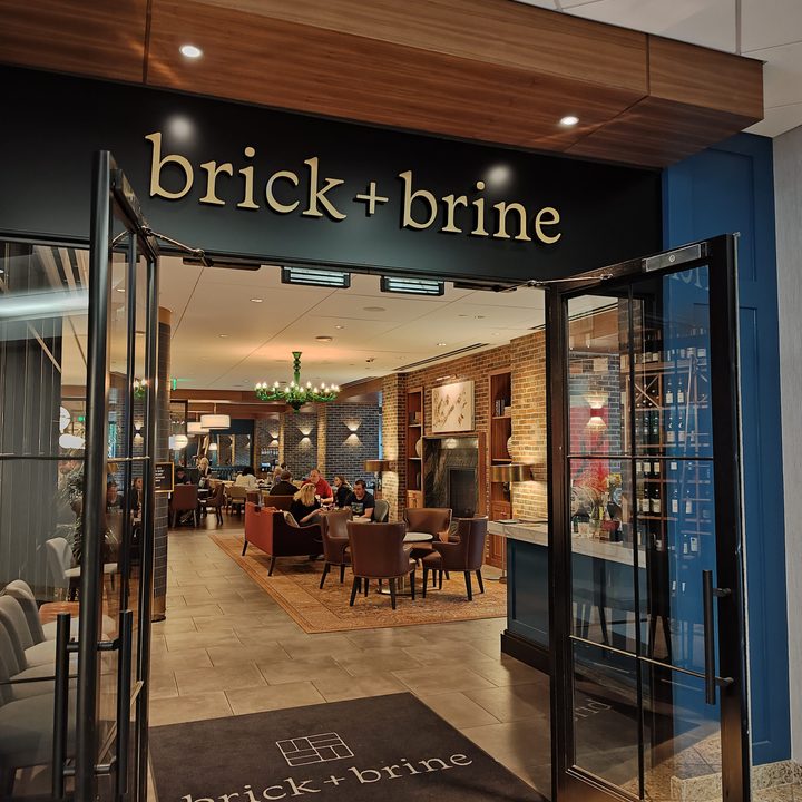 Photo of the entrance to a restaurant called "Brick + Brine," taken with the Motorola Edge Plus (2023).