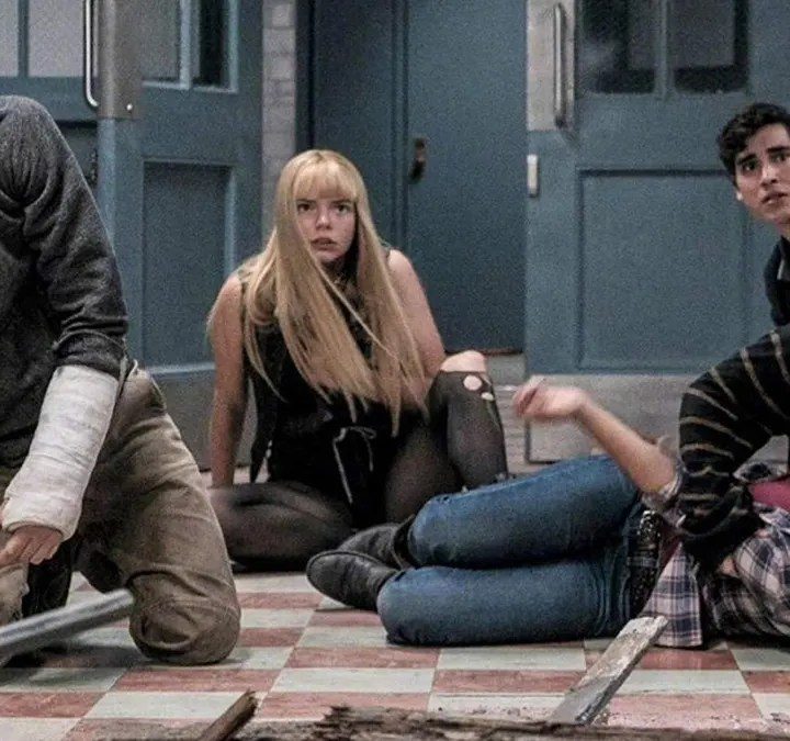 Teens lie on the floor in New Mutants.