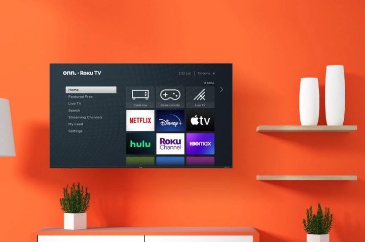 The onn. 75&rdquo; Class 4K UHD (2160P) LED Frameless Roku Smart TV is a living room with orange walls.