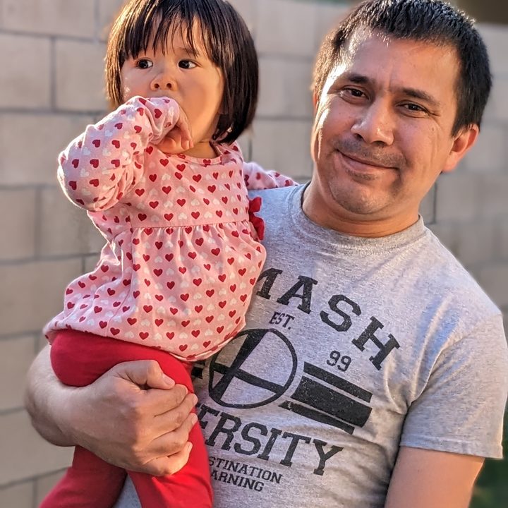 Portrait of dad and daughter taken with Google Pixel 6a