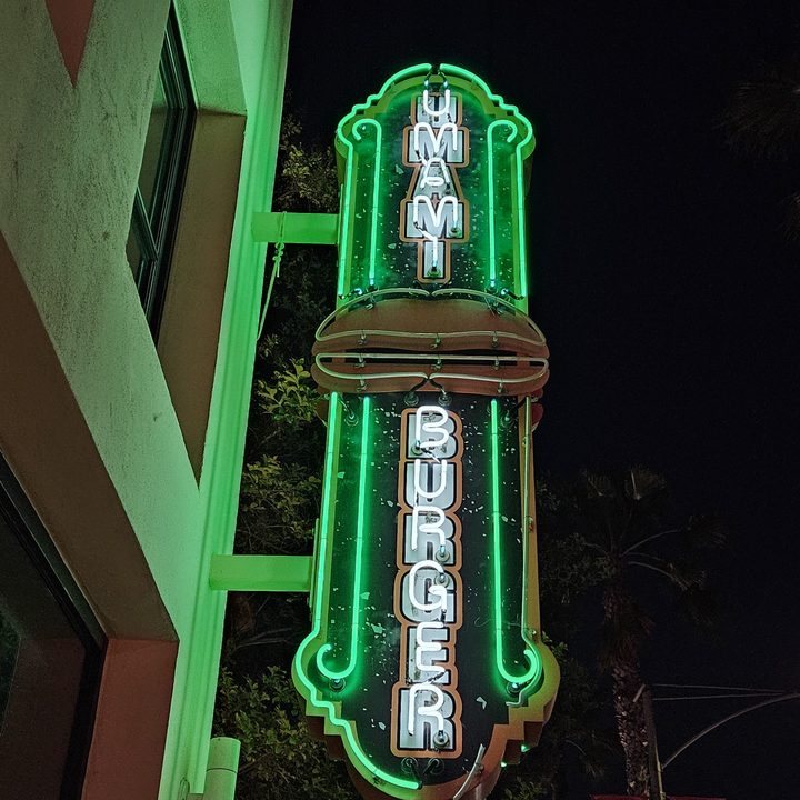 Night mode shot of Umami Burger neon sign taken with a Samsung Galaxy S23