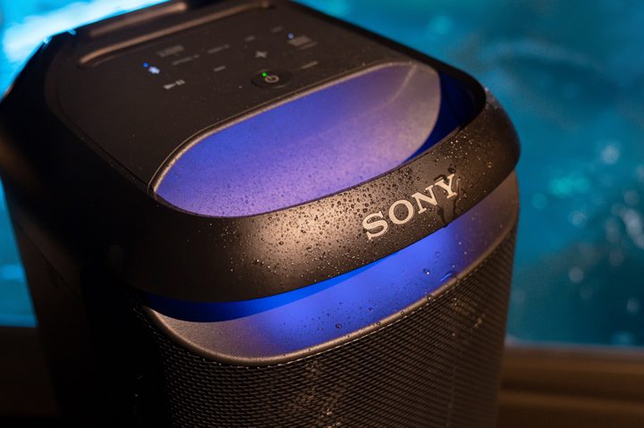 Top of Sony SRS-XV800 with water drops and lights on.