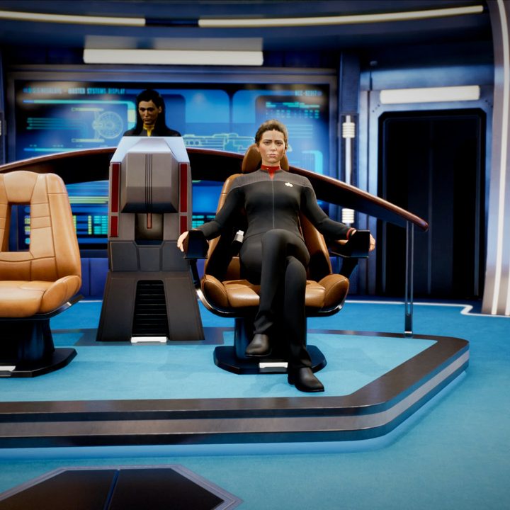 The captain of the USS Resolute sits in a chair in Star Trek Resurgence.