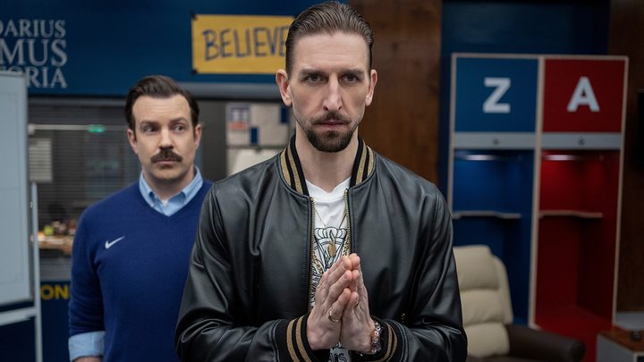 Zava with his hands together in the locker room in a scene from Ted Lasso.